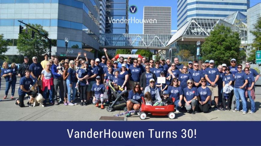 Image of a large group of VanderHouwen employees that states "VanderHouwen Turns 30!"