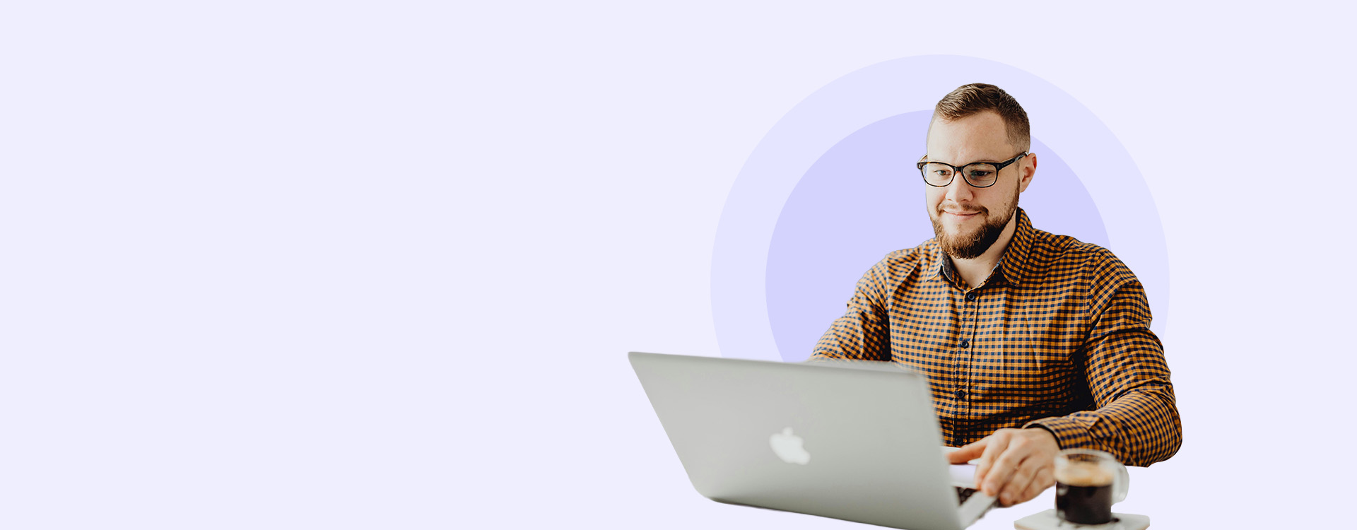 VanderHouwen banner featuring a professional working on a laptop, promoting the Job Interview Guidebook with expert tips to help candidates succeed.